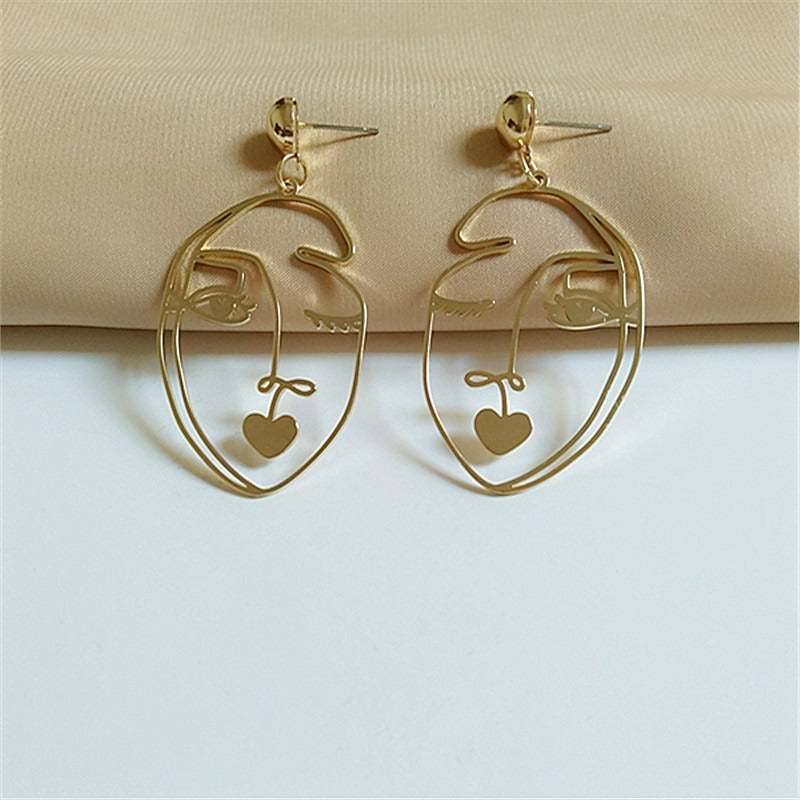 One-of-a-kind Metal Face Designer Earrings