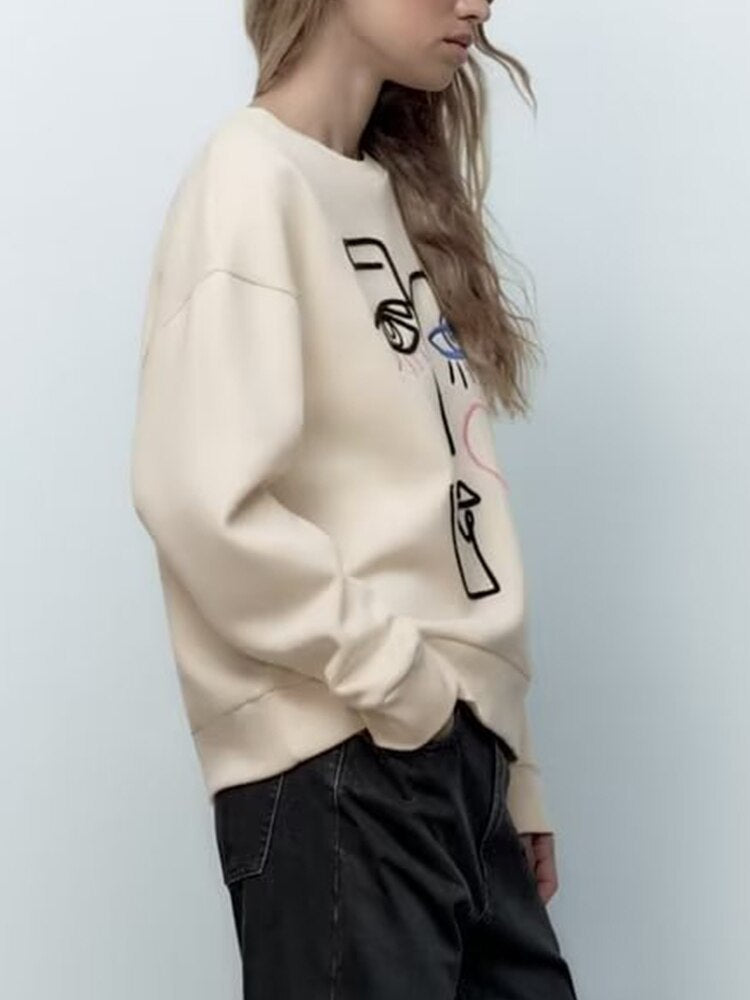 Cool Sweatshirt with an Embroidered Face Design