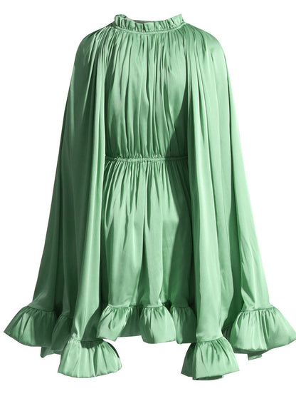 Beautiful Cape Dress with a Cinched Waist and Ruffled Hem