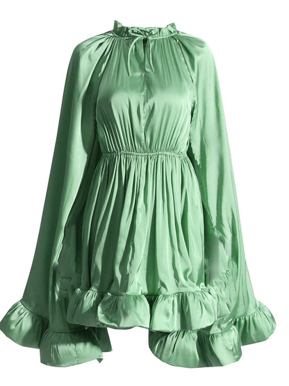 Beautiful Cape Dress with a Cinched Waist and Ruffled Hem