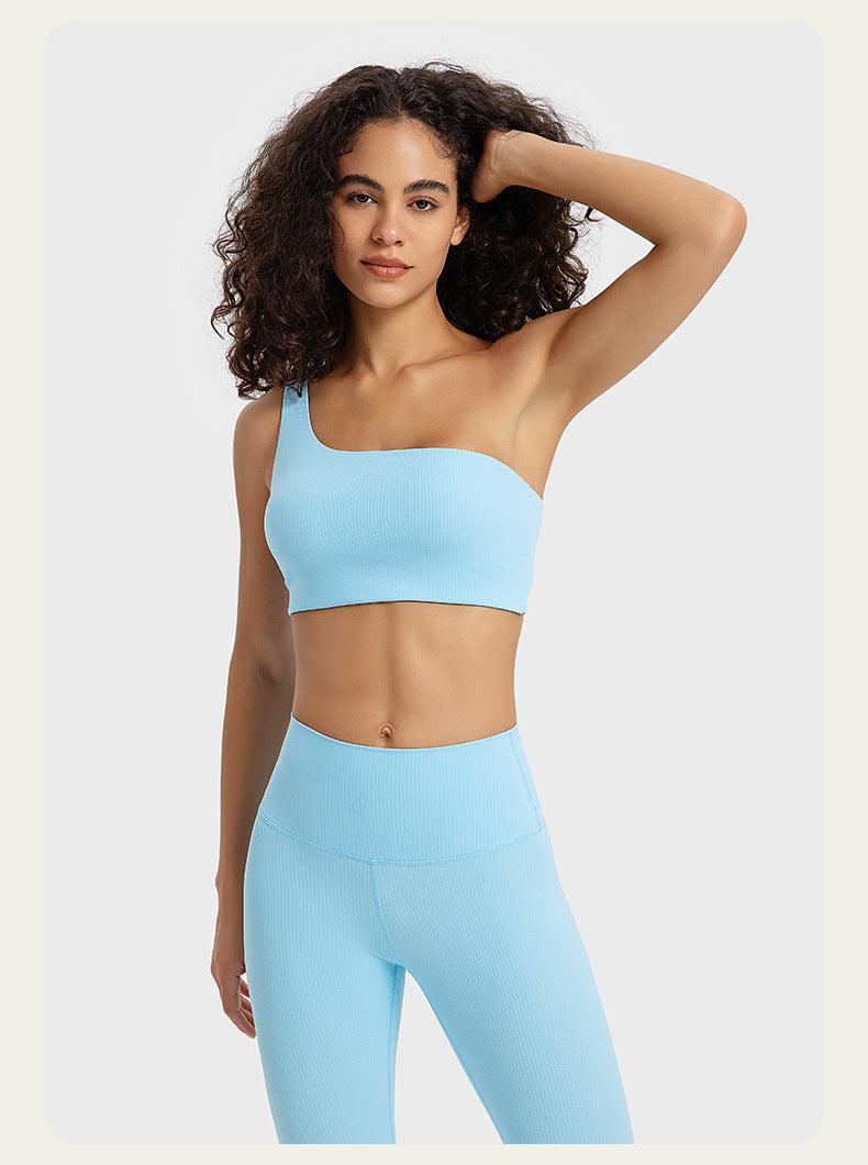 Beautifully Designed Fitness Leggings and a Stylish Oblique Shoulder Bra  Top