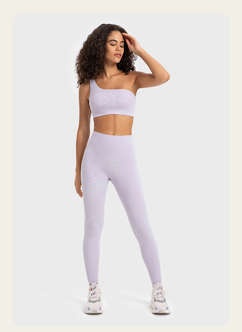 Beautifully Designed Fitness Leggings and a Stylish Oblique Shoulder Bra  Top