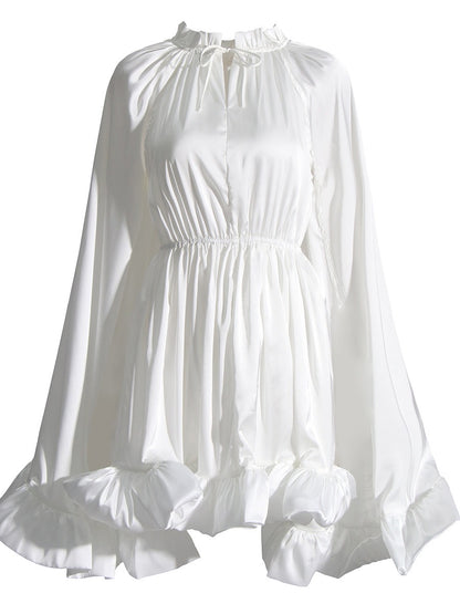 Beautiful Cape Dress with a Cinched Waist and Ruffled Hem