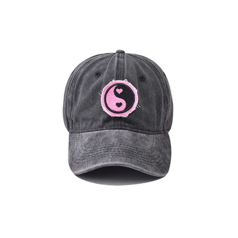 Distressed Pure Cotton  Baseball Cap with an Embroidered Pink and Black Yin-Yang Logo