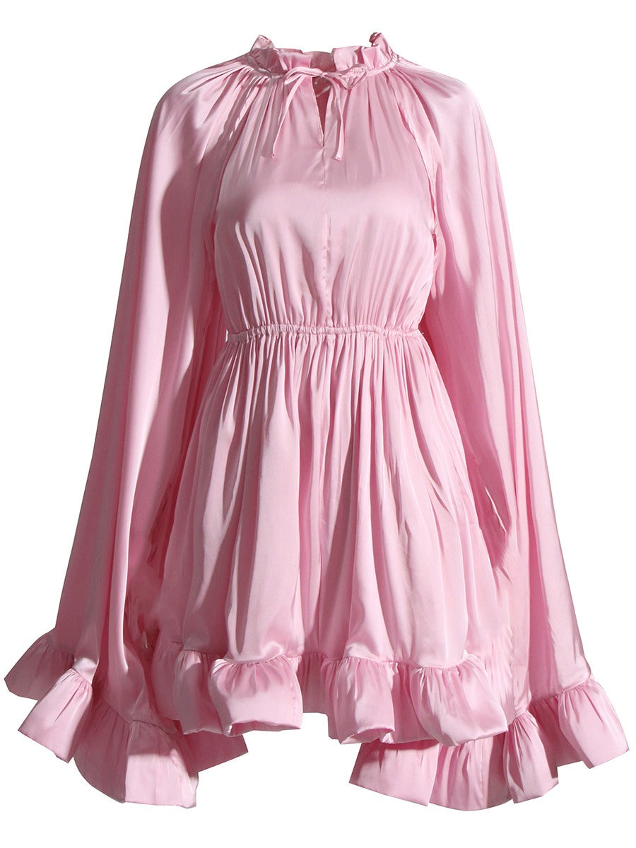 Beautiful Cape Dress with a Cinched Waist and Ruffled Hem