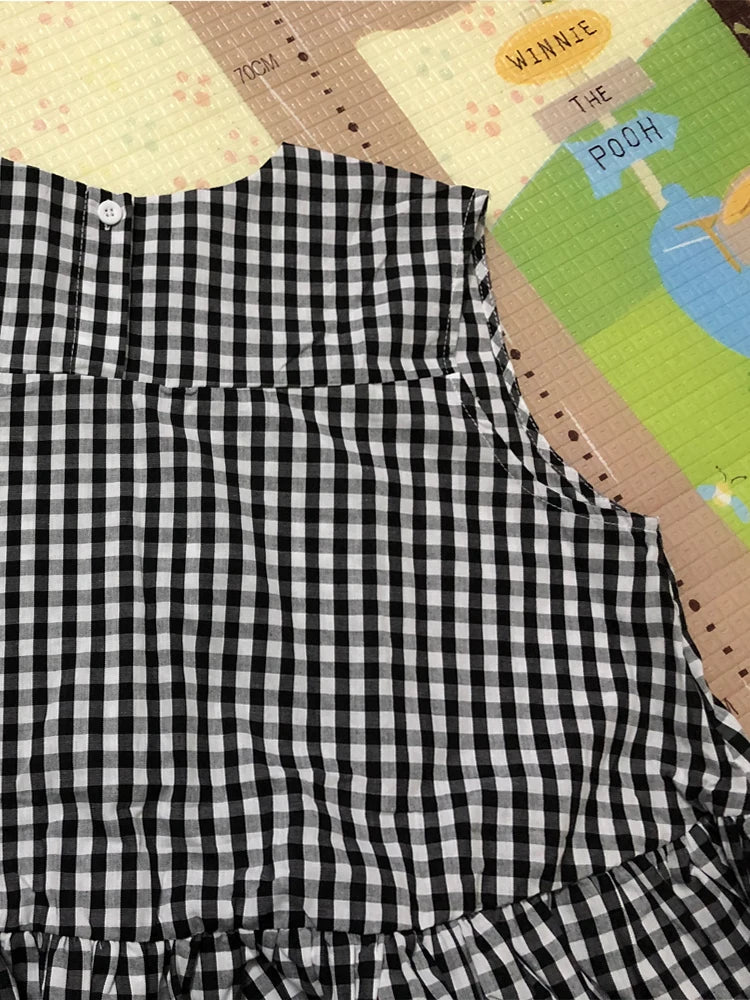 Sleeveless Tiered Ruffle Swing Tunic Top