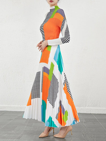 Bold Colored Design 2 Pieces Set of Pleated Long Skirt and a Matching High Collar Long Sleeved Top. Comes in Green  and Orange.