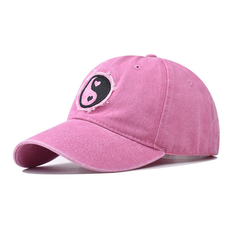 Distressed Pure Cotton  Baseball Cap with an Embroidered Pink and Black Yin-Yang Logo