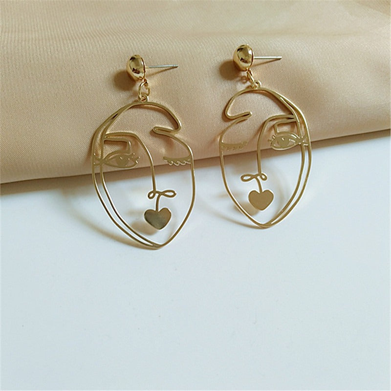 One-of-a-kind Metal Face Designer Earrings