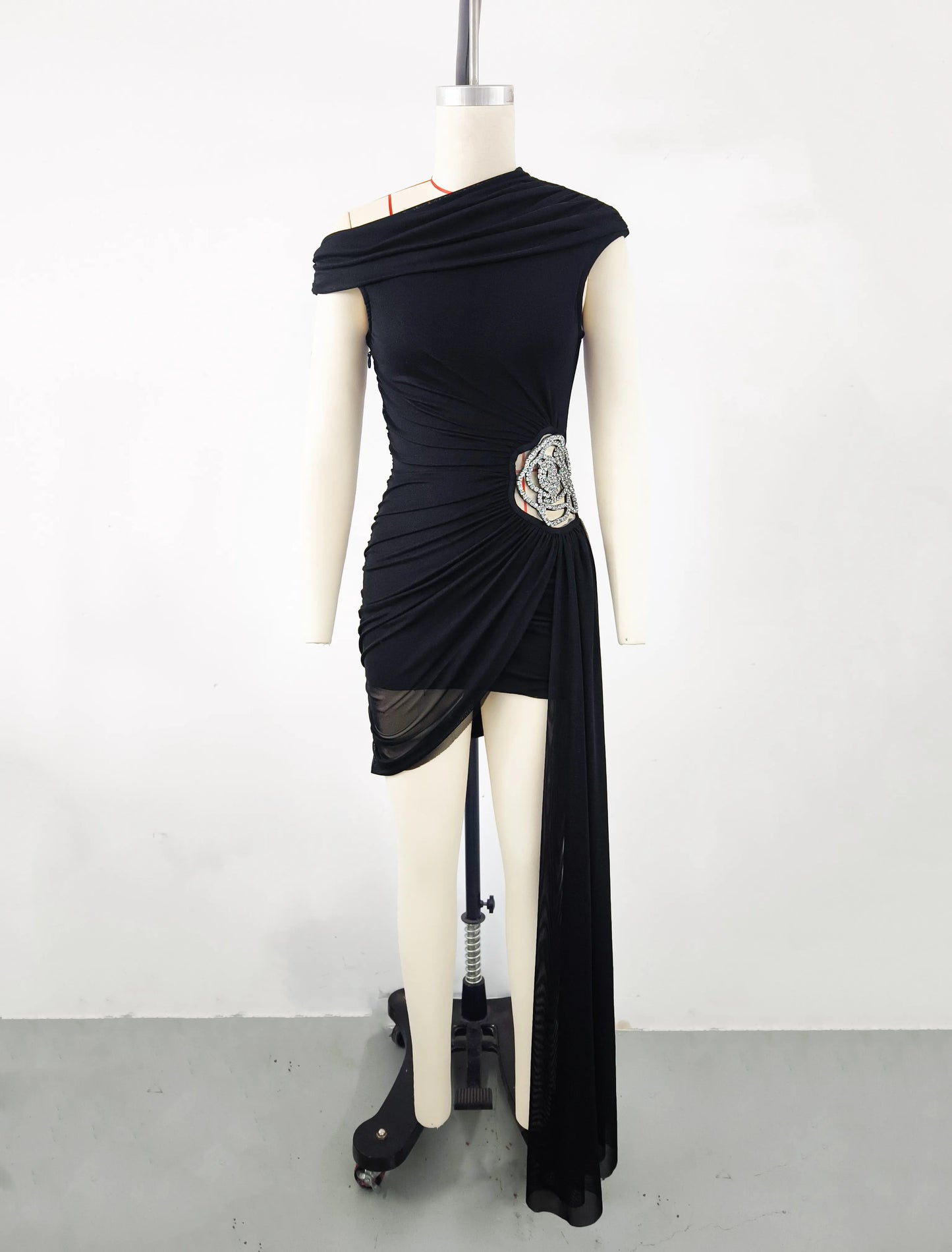 Elegant Black Asymmetrical Draped Mini Dress with Floral Embellishment