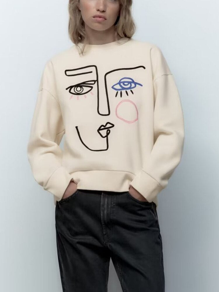 Cool Sweatshirt with an Embroidered Face Design