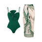 One-piece Green Swimsuit Paired with a Matching Floral Sarong