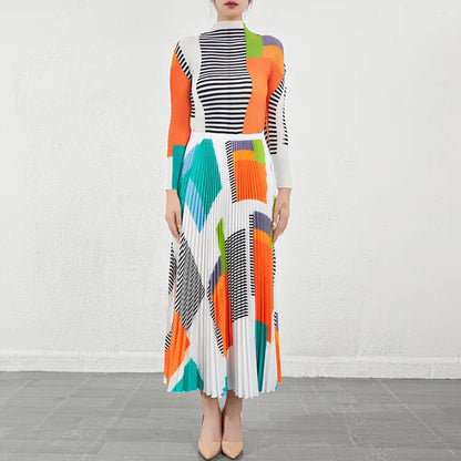 Bold Colored Design 2 Pieces Set of Pleated Long Skirt and a Matching High Collar Long Sleeved Top. Comes in Green  and Orange.