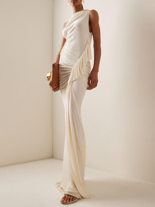 Stylish Slim Fitting Hip-Hugging Long Dress Sleeveless Design  With a Side Pleat.