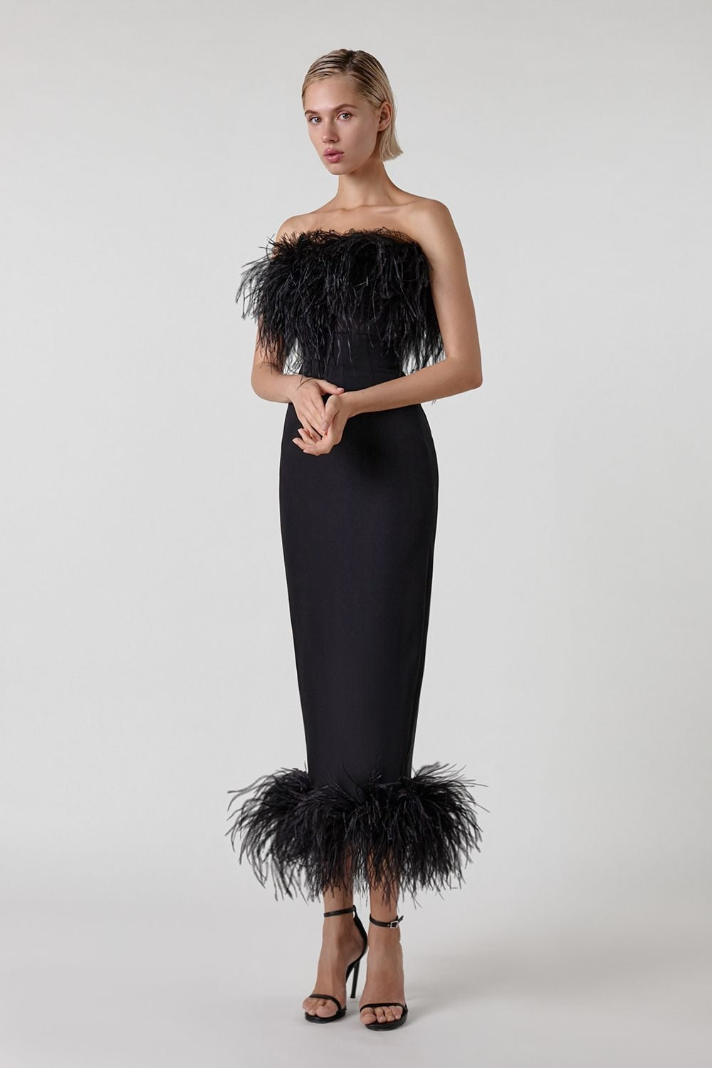 Elegant Sleeveless Dress with Feather Design on Hem and Bodice