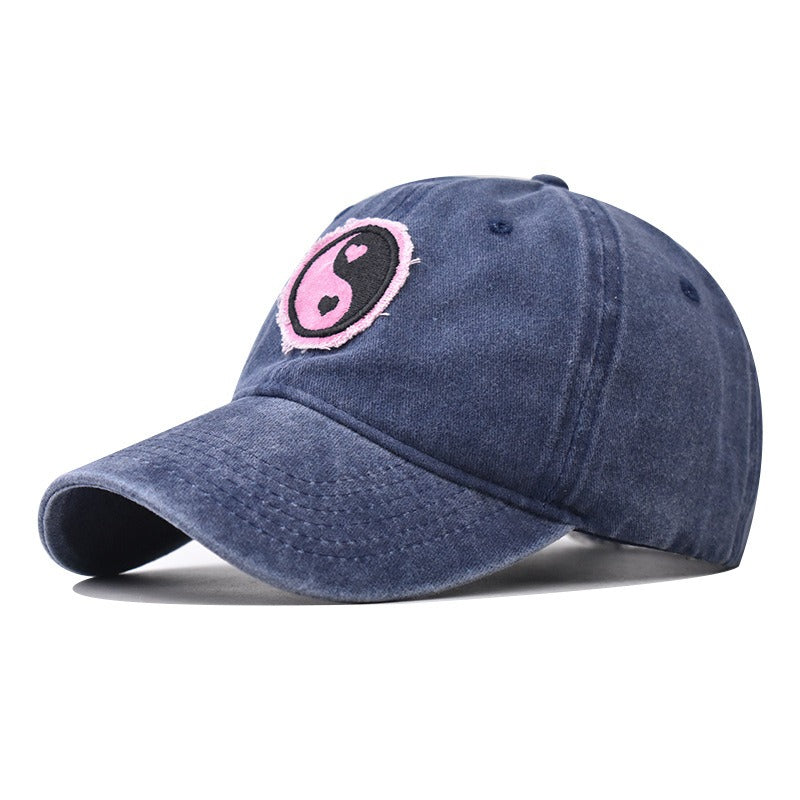 Distressed Pure Cotton  Baseball Cap with an Embroidered Pink and Black Yin-Yang Logo