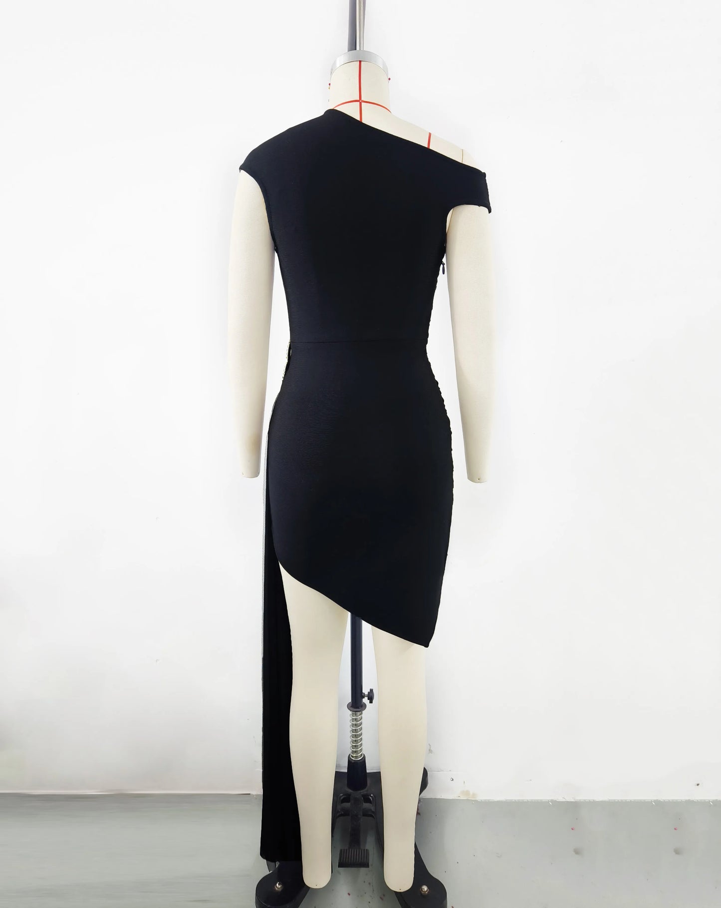 Elegant Black Asymmetrical Draped Mini Dress with Floral Embellishment